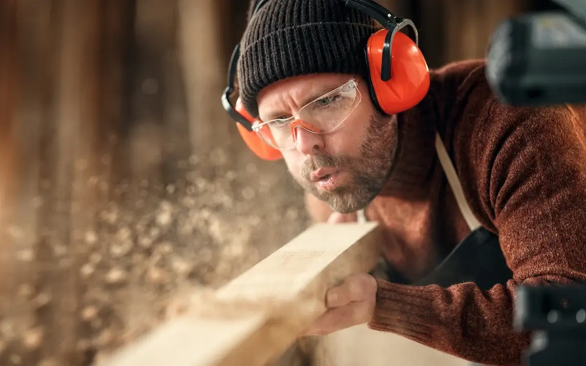 experienced woodworker demonstrating woodworking techniques and craftsmanship